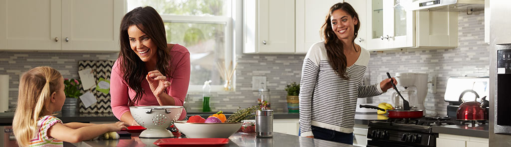 Couple cooking in kitchen